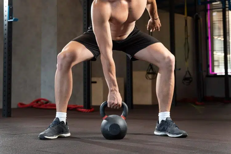 Man Doing Kettlebell Swings