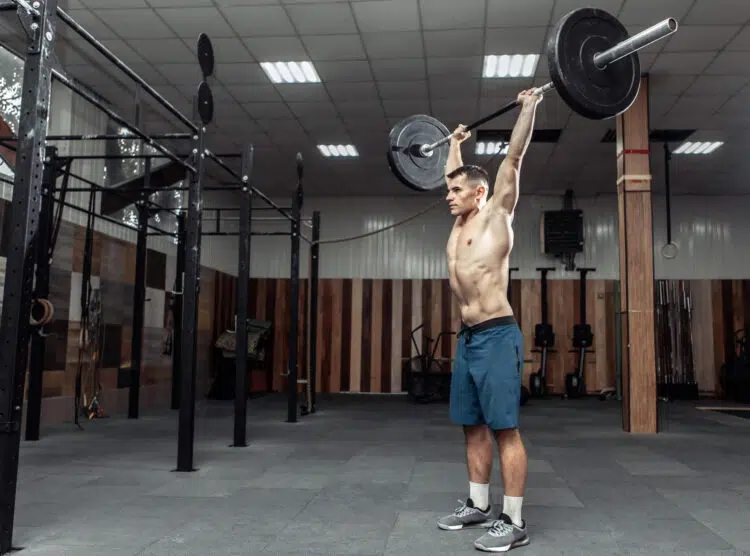 Man Practicing Barbell Overhead