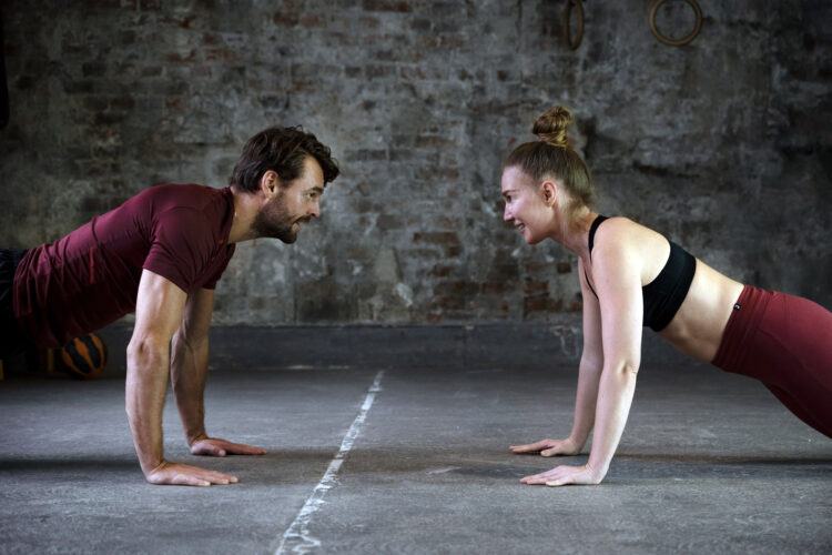 Couple Doing Burpees