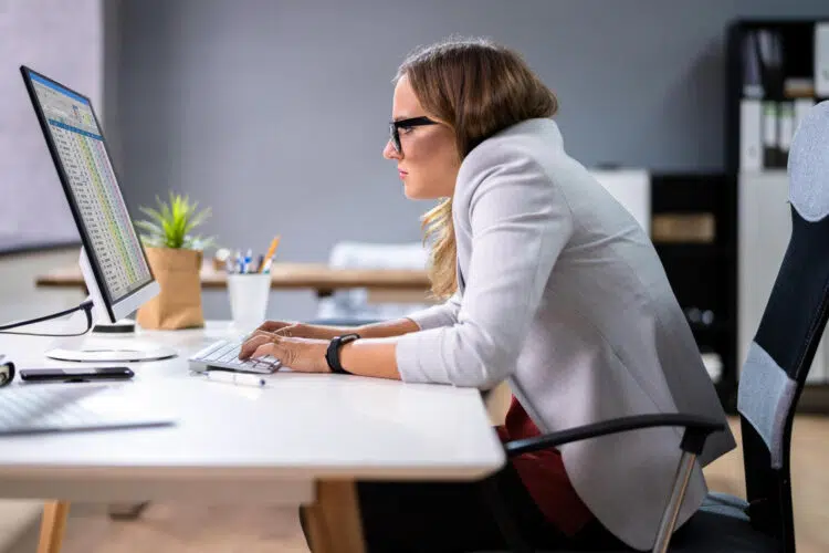 Woman Sitting In Bad Posture