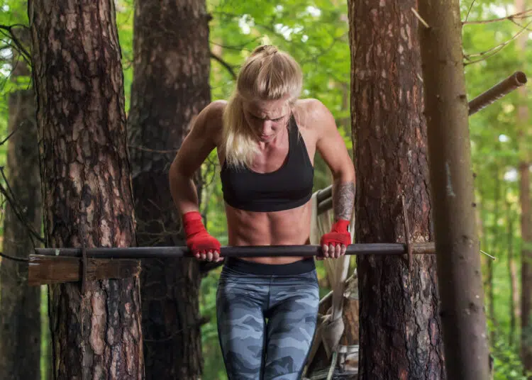 Woman Doing Muscle Up