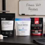 Real reviewed carb powder products arranged on a FitnessVolt review table