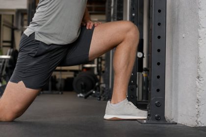 The knee-to-wall test helps lifters check ankle mobility before changing squat stance or shoes.