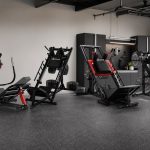 Leg press hack squat machines arranged in a FitnessVolt lower-body review scene