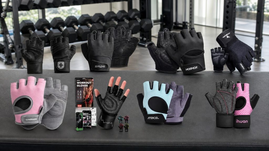 Fingerless weightlifting gloves resting on a barbell