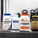 L-tyrosine supplement bottles on a gym counter