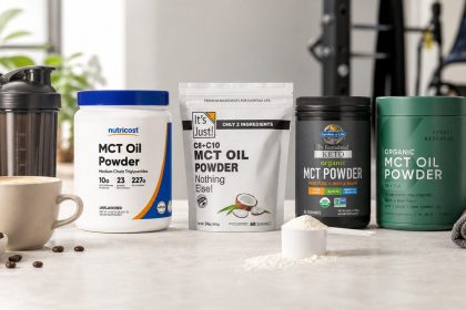 MCT oil powder tubs beside coffee and training gear