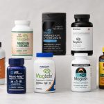 Magnesium L-threonate supplement bottles arranged on a clean fitness nutrition shelf