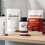 Urolithin A supplement bottles and softgels arranged on a bright home gym nutrition shelf