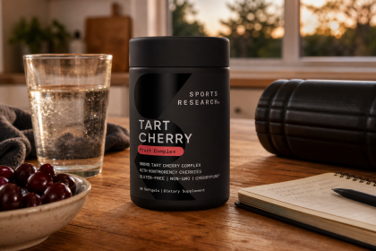 Sports Research Tart Cherry Fruit Complex beside water, cherries, and recovery gear