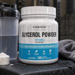 Jacked Factory Glycerol Pump tub beside water and gym gear