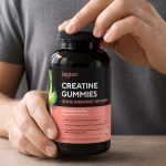 Legion Green Apple creatine gummies bottle being opened
