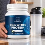 MRM Egg White Protein Vanilla 24 oz tub beside a shaker