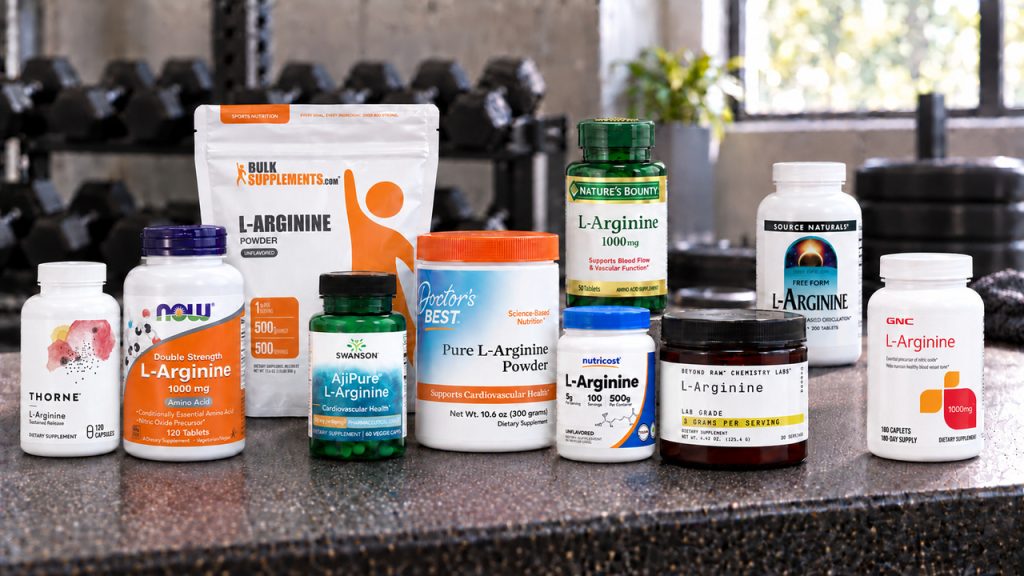 Ten l-arginine supplements arranged on a gym bench